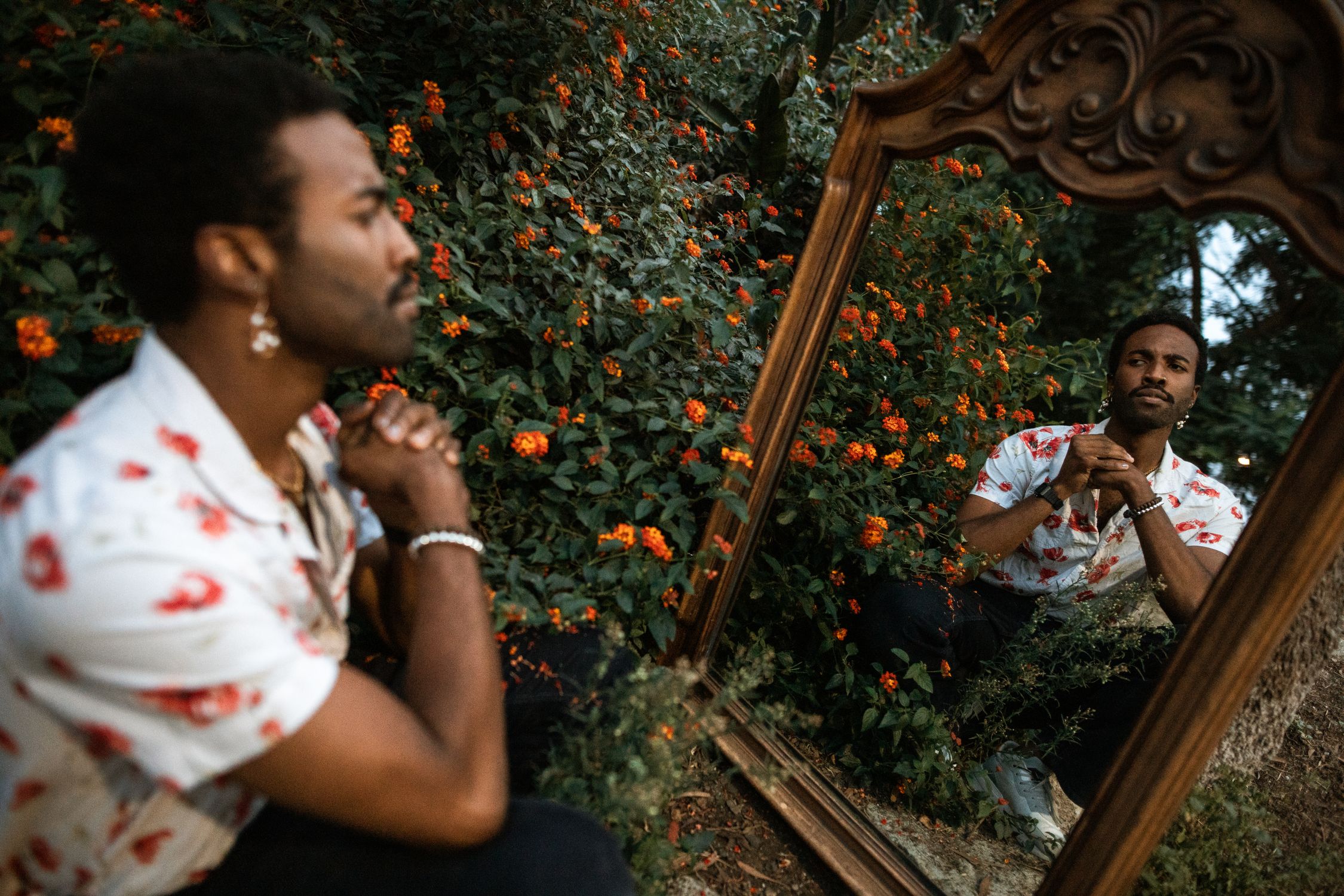 A Man Looking at a Mirror